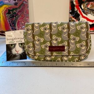Bungalow 360 little clutch purse brand new never used measures 9” x 6”